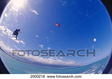 Kite Surfing, Back View Man Lifted From Ocean, Holding On To Kite View Large Photo Image Stock Photo - Kite Surfing, Back View Man Lifted From Ocean, Holding On To Kite. Fotosearch