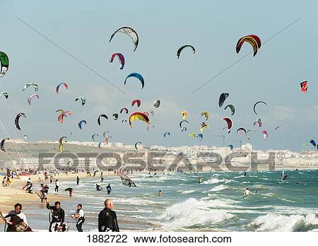 Stock Image - Kite Surfing On Dos Mares Beach In Front Of Hotel Dos Mares; Tarifa, Costa De La Luz, Andalusia, Spain. Fotosearch