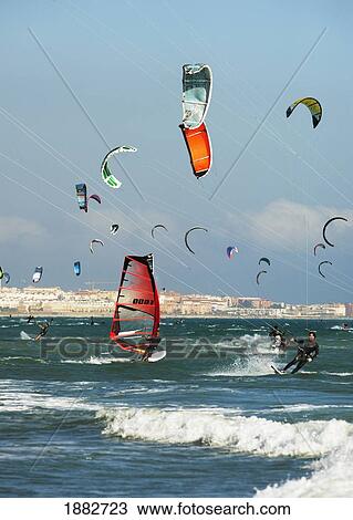 Kite Surfing On Dos Mares Beach In Front Of Hotel Dos Mares; Tarifa, Costa De La Luz, Andalusia, Spain View Large Photo Image Stock Image - Kite Surfing On Dos Mares Beach In Front Of Hotel Dos Mares; Tarifa, Costa De La Luz, Andalusia, Spain. Fotosearch