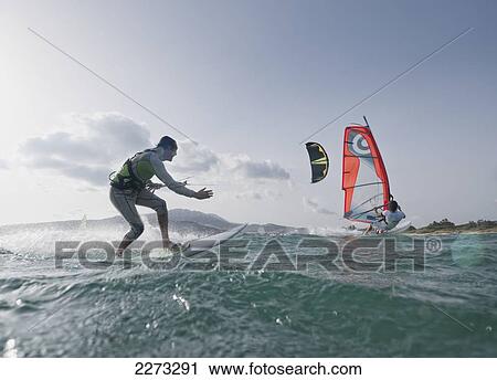 Kitesurfer and windsurfer along the coast; tarifa cadiz andalusia spain View Large Photo Image Stock Image - Kitesurfer and windsurfer along the coast; tarifa cadiz andalusia spain. Fotosearch
