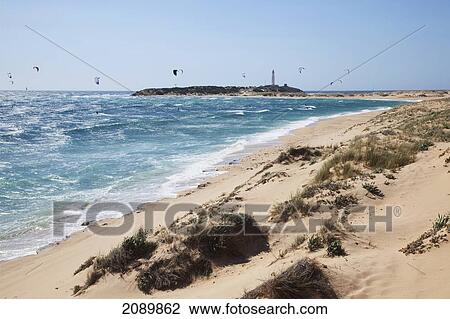 Stock Image - Kitesurfing Off The Coast Of The Beach At Zahora; Andalusia, Spain. Fotosearch