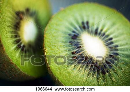Picture - Kiwi Fruit Halves, Fresh Cut.. Fotosearch