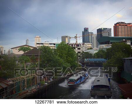 Stock Image - Klong boats; Bangkok, Thailand. Fotosearch