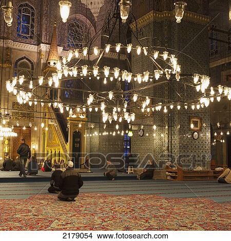 Picture - Kneeling In The Mosque Of The Valide Sultan; Istanbul Turkey. Fotosearch