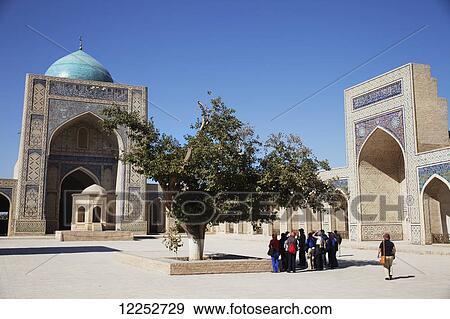 Kok Gumbaz (Blue dome) on left and courtyard of Kalon mosque, Poi Kalon complex, Old Town; Bukhara, Uzbekistan View Large Photo Image Stock Photo - Kok Gumbaz (Blue dome) on left and courtyard of Kalon mosque, Poi Kalon complex, Old Town; Bukhara, Uzbekistan. Fotosearch