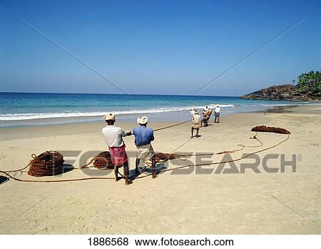 Stock Photo - Kovalam Beach Fishermen. Fotosearch
