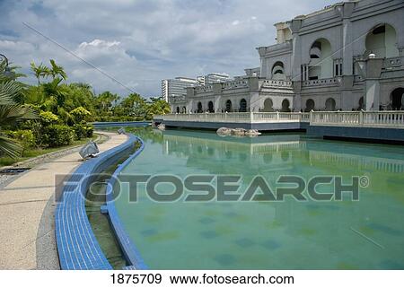 Stock Photo - Kuala Lumpur, Malaysia; A Building With Water Around It. Fotosearch