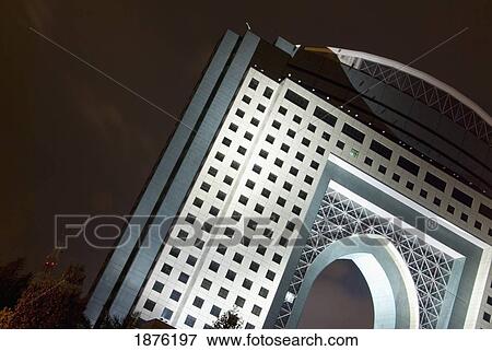 Kuala Lumpur, Malaysia; A Building With An Arch Illuminated At Night View Large Photo Image Stock Photo - Kuala Lumpur, Malaysia; A Building With An Arch Illuminated At Night. Fotosearch