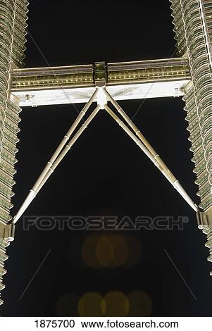 Stock Image - Kuala Lumpur, Malaysia; The Pedway Stretching Between The Petronas Twin Towers. Fotosearch