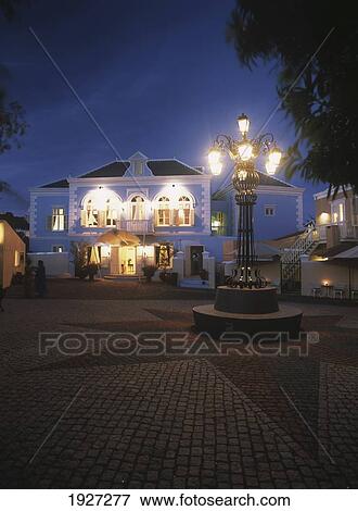 Stock Photo - Kura Hulanda Hotel At Dusk. Fotosearch