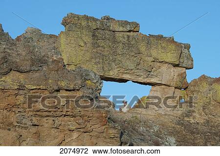 Stock Image - La Fenetre D'isalo Rock Formation, Isalo National Park, Fianarantsoa Province, Madagascar. Fotosearch