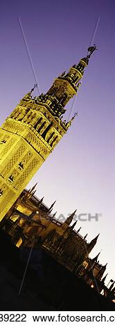 Stock Image - La Giralda Bell Tower At Dusk. Fotosearch