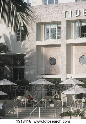 Lady Having Breakfast On The Verandah Of The Tides Hotel, Ocean Drive, South Beach, Miami View Large Photo Image Stock Photo - Lady Having Breakfast On The Verandah Of The Tides Hotel, Ocean Drive, South Beach, Miami. Fotosearch