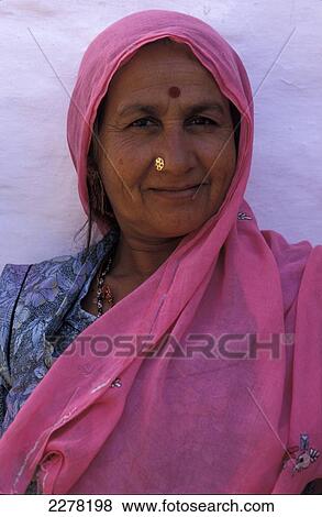 Lady wearing headscarf, Jodhpur, Rajasthan, India View Large Photo Image Stock Photo - Lady wearing headscarf, Jodhpur, Rajasthan, India. Fotosearch