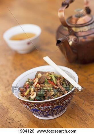 Laghman Noodle Dish With Teapot And Cups, Kashgar, Xinijiang, China. View Large Photo Image Stock Photograph - Laghman Noodle Dish With Teapot And Cups, Kashgar, Xinijiang, China.. Fotosearch