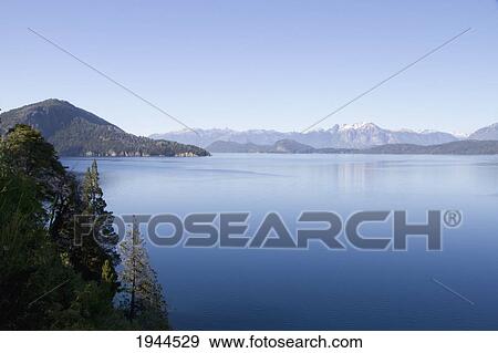 Lago Nahuel Huapi and Andes Mountains, Nahuel Huapi National Park, Neuquen, Argentina View Large Photo Image Stock Photo - Lago Nahuel Huapi and Andes Mountains, Nahuel Huapi National Park, Neuquen, Argentina. Fotosearch