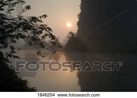 Picture - Lake In Mountain Area, Sunset. Fotosearch