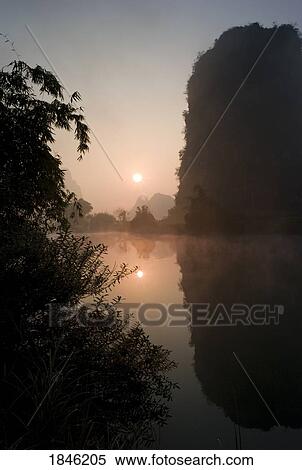 Stock Photography - Lake In Mountain Area, Sunset. Fotosearch