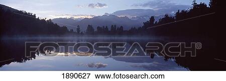 Stock Photo - Lake Matheson At Dusk. Fotosearch