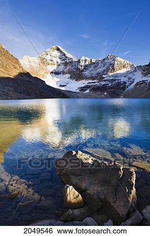 Lake Mcarthur And Mount Biddle At Sunset, Yoho National Park, British Columbia View Large Photo Image Stock Photograph - Lake Mcarthur And Mount Biddle At Sunset, Yoho National Park, British Columbia. Fotosearch