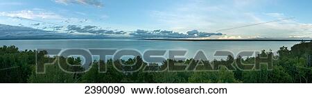 Stock Image - Lake Winnipeg at sunset in Hecla-Grindstone Provincial Park; Riverton, Manitoba, Canada. Fotosearch