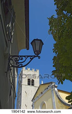 Stock Image - Lamp Post By St Stephens Church In Motovun, Istria, Croatia. Fotosearch