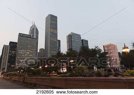 Lamp Posts Along A Promenade With Skyscrapers In The Background At Dusk; Chicago Illinois United States Of America View Large Photo Image Stock Photography - Lamp Posts Along A Promenade With Skyscrapers In The Background At Dusk; Chicago Illinois United States Of America. Fotosearch