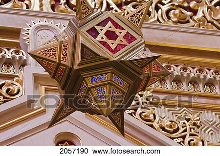 Stock Image - Lamp With The Star Of David Above The Torah Ark Of The Great Synagogue On Dohany Street, Budapest, Hungary. Fotosearch