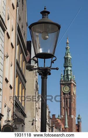 Lamppost and clock tower of the Main Town Hall, Dluga Street, old town district, Gdansk, Poland, Gdansk, Poland. View Large Photo Image Stock Photo - Lamppost and clock tower of the Main Town Hall, Dluga Street, old town district, Gdansk, Poland, Gdansk, Poland.. Fotosearch