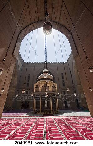 Stock Image - Lamps In An Iwan And Ablution Fountain Of Sultan Hassan Mosque And Madrassa, Cairo, Al Qahirah, Egypt. Fotosearch
