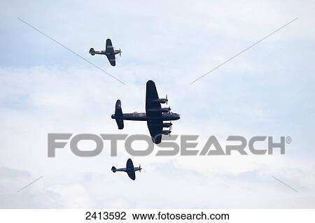 Stock Image - Lancaster bomber, spitfire and hurricane; Sunderland, Tyne and Wear, England. Fotosearch
