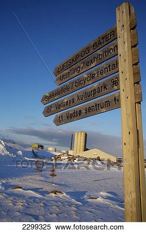 Stock Photography - Landmark sign in winter; Vadso, Norway. Fotosearch