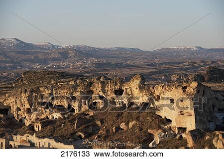 Stock Image - Landscape And Buildings Built Into Caves; Urgup Nevsehir Turkey. Fotosearch