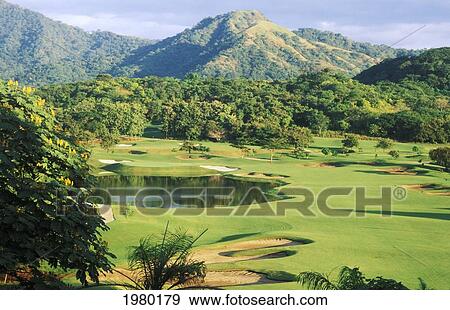 Stock Photo - Landscape of golf course at Melia Playa Conchal; Costa Rica. Fotosearch
