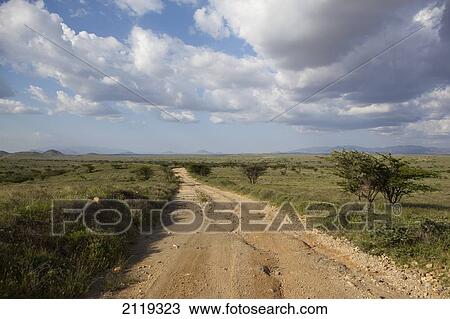 Stock Image - Landscape with road; Kenya. Fotosearch