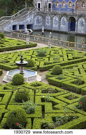 Landscaped hedges, paths and a water fountain at Benfica; Lisbon, Portugal, Europe View Large Photo Image Stock Photo - Landscaped hedges, paths and a water fountain at Benfica; Lisbon, Portugal, Europe. Fotosearch