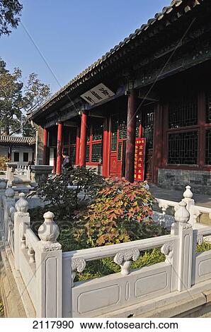 Stock Image - Landscaping Outside A Building With Red Pillars; Beijing China. Fotosearch