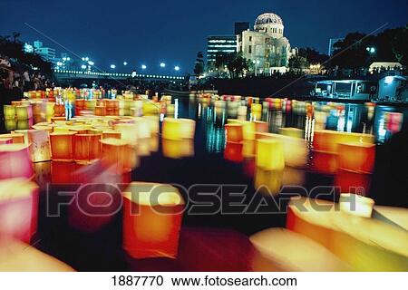 Lanterns Floating Down Motoyasu River At Night, A-Bomb Dome In Background View Large Photo Image Stock Image - Lanterns Floating Down Motoyasu River At Night, A-Bomb Dome In Background. Fotosearch