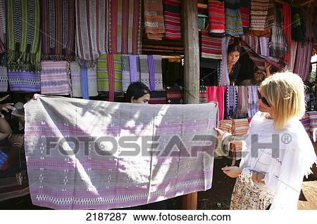 Stock Photo - Laos, Champasak Province Bolaven Plateau Hill Tribe Fabrics Tourist Stall. Fotosearch