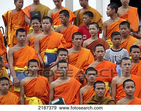 Stock Photo - Laos, Luang Prabang Monks In A Buddhist Wat. Fotosearch