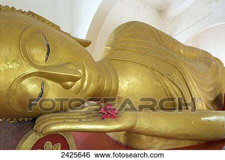 Stock Photograph - Laos, Luang Prabang, Wat Para Bat Tai, reclining Buddha. Fotosearch