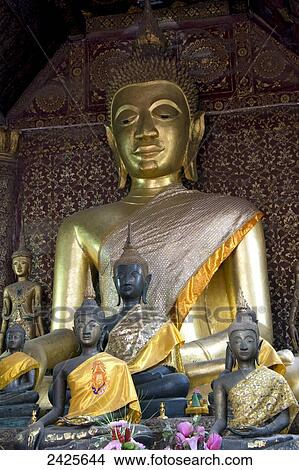 Laos, Luang Prabang, Wat Xieng Thong, Main Temple (Sim), sitting Buddhas View Large Photo Image Picture - Laos, Luang Prabang, Wat Xieng Thong, Main Temple (Sim), sitting Buddhas. Fotosearch