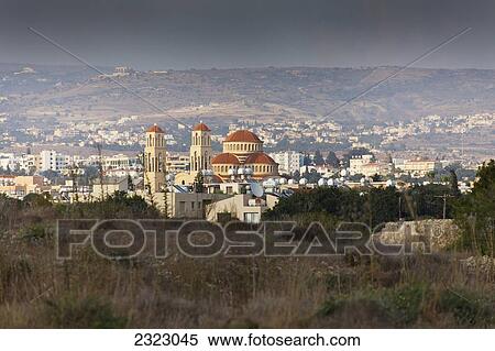 Stock Photography - Large building with red dome in distance; Paphos, Cyprus. Fotosearch