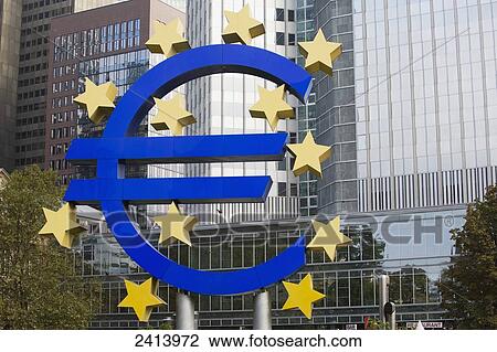 Large Euro monument against the background of large skyscrapers; Frankfurt am Main, Germany View Large Photo Image Stock Image - Large Euro monument against the background of large skyscrapers; Frankfurt am Main, Germany. Fotosearch