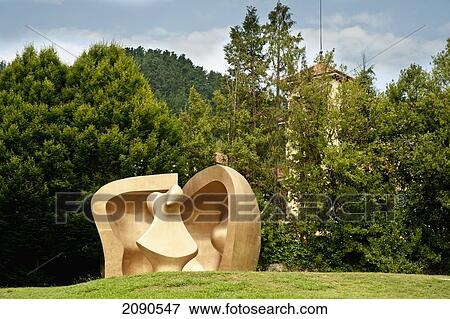 Stock Photo - Large Figure In A Shelter, Henry Moore's Sculpture In Parque De Los Pueblos De Europa, Gernika-Lumo, Basque Country, Spain. Fotosearch