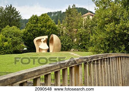 Stock Photo - Large Figure In A Shelter, Henry Moore's Sculpture In Parque De Los Pueblos De Europa, Gernika-Lumo, Basque Country, Spain. Fotosearch