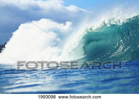 Stock Photo - Large Green Wave Crahing, View From Side.. Fotosearch
