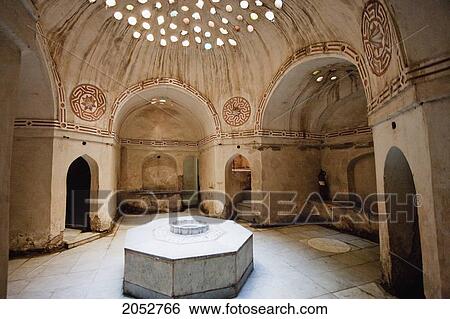 Large Marble Stone At The Center For People To Lie On And Dome Decorated With Small Glass Windows That Create A Half-Light In The Caldarium Of Hammam Azuz, 18Th Century Public Baths, Rosetta (Rashid), Beheira, Egypt View Large Photo Image Stock Photograph - Large Marble Stone At The Center For People To Lie On And Dome Decorated With Small Glass Windows That Create A Half-Light In The Caldarium Of Hammam Azuz, 18Th Century Public Baths, Rosetta (Rashid), Beheira, Egypt. Fotosearch