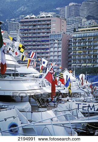Stock Image - Large Motor Boats Moored In Monaco Port During Grand Prix Time.. Fotosearch