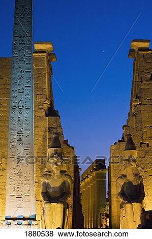 Large Obelisk And Colossi Statues Of Pharaohs View Large Photo Image Stock Photo - Large Obelisk And Colossi Statues Of Pharaohs. Fotosearch